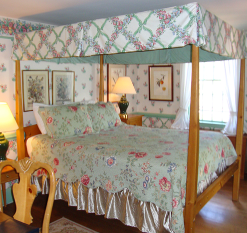 a bed with a canopy over it