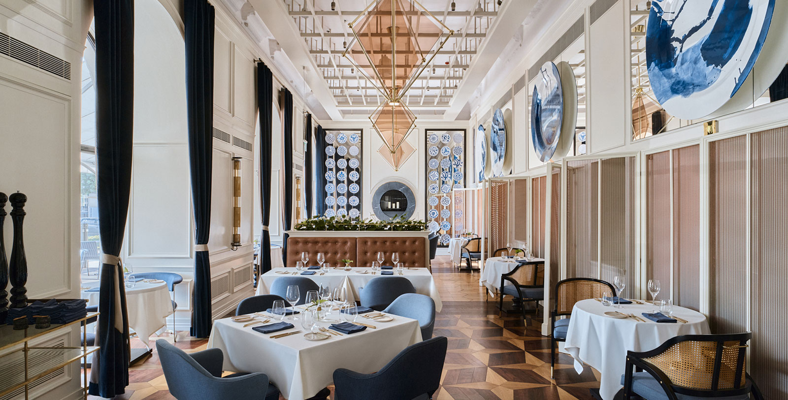 a restaurant with tables and chairs