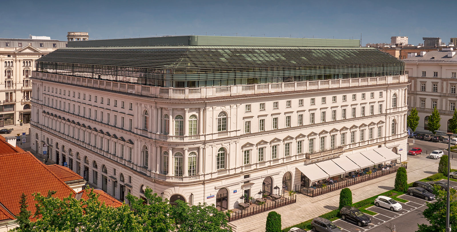 a large white building with a roof