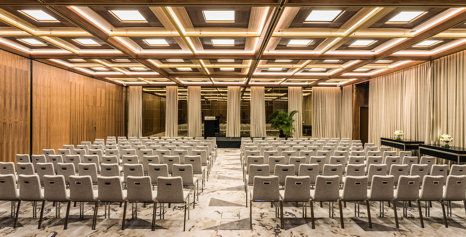 a room with rows of chairs