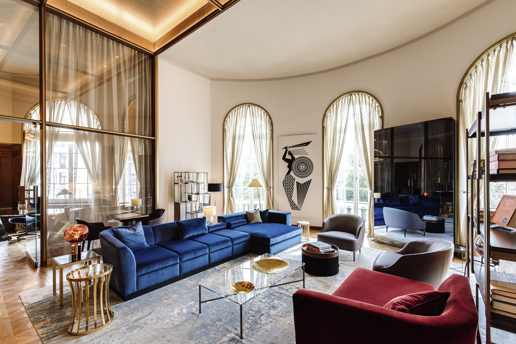a room with a large couch and a television