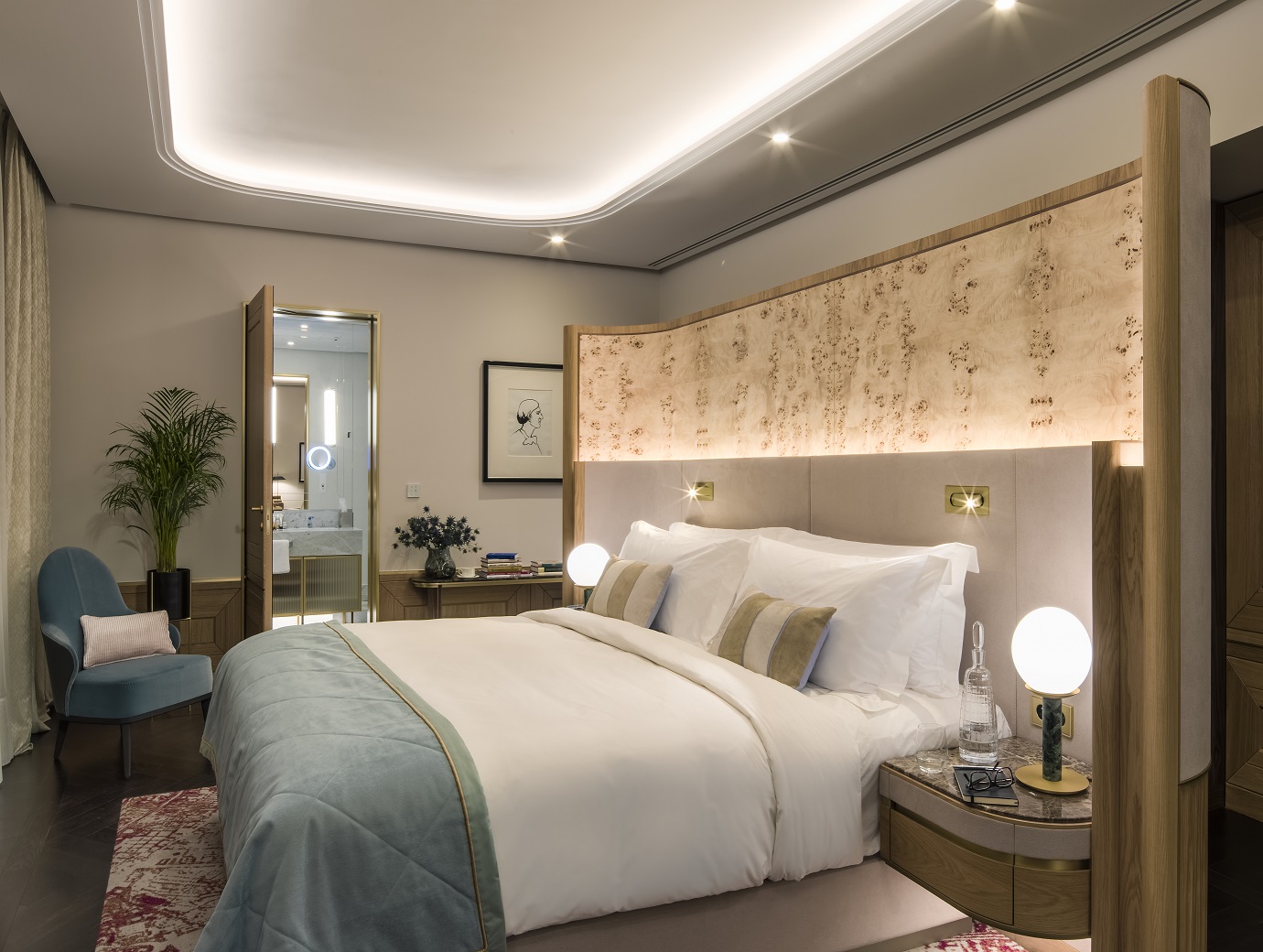 a bedroom with a bed and a mirror