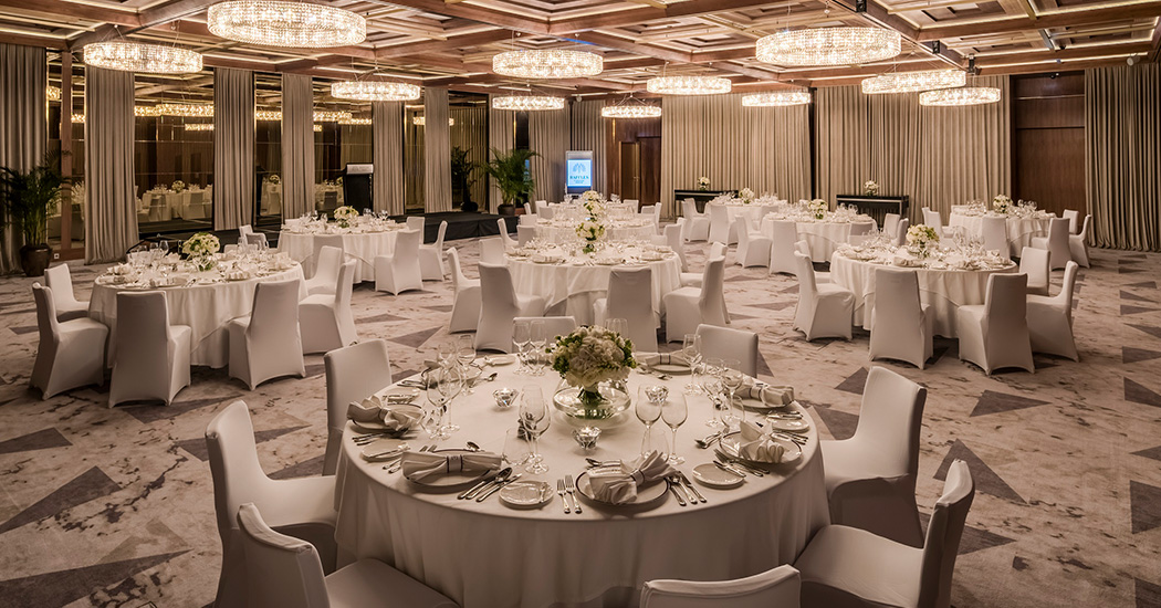 a large room with tables and chairs