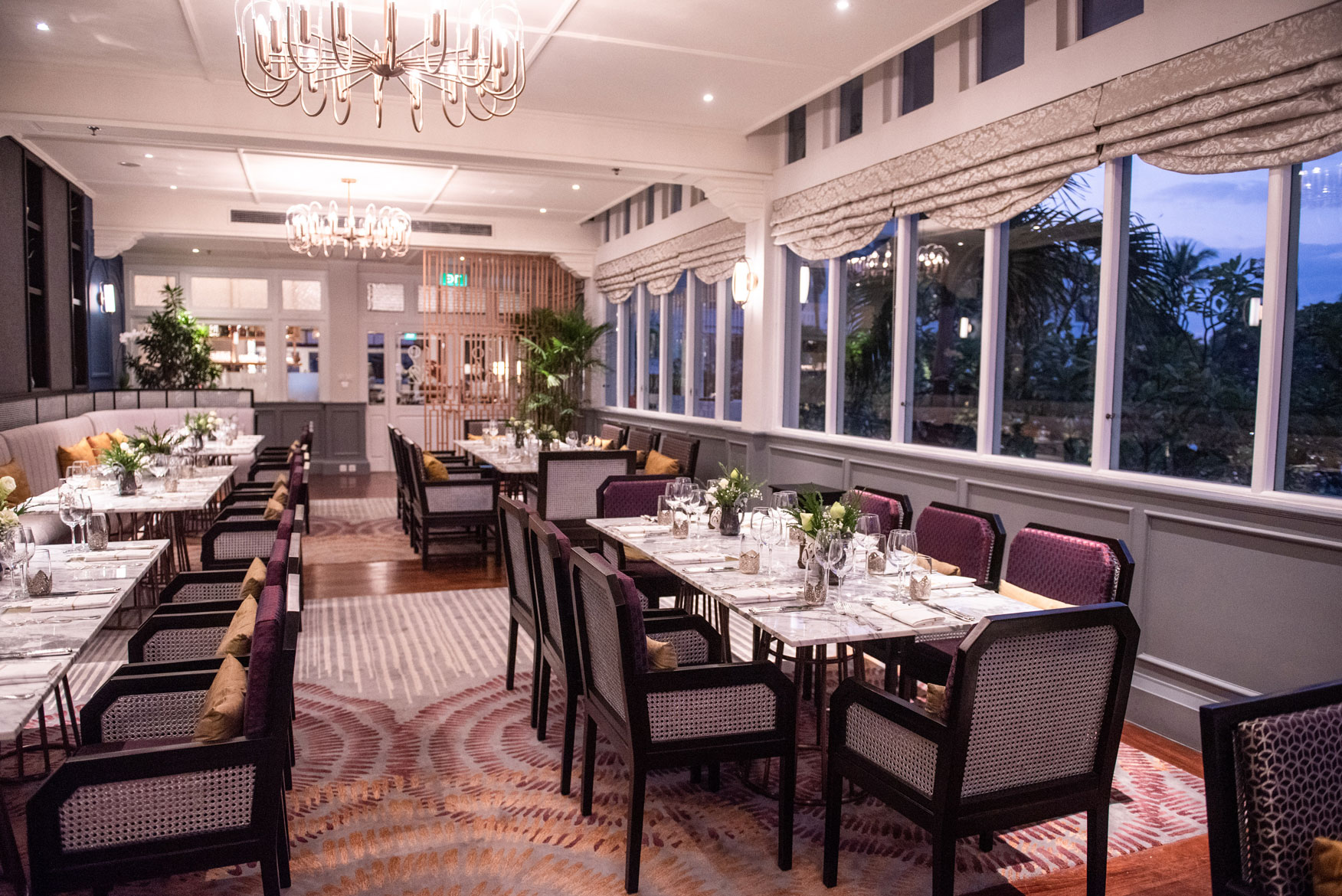 a room with tables and chairs