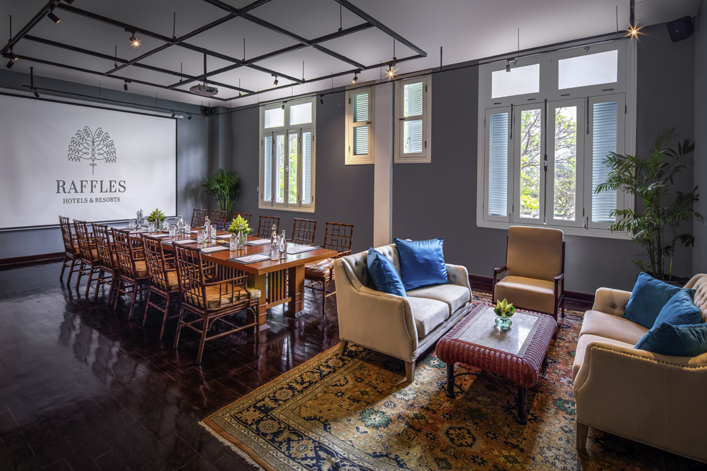 a room with a table and chairs
