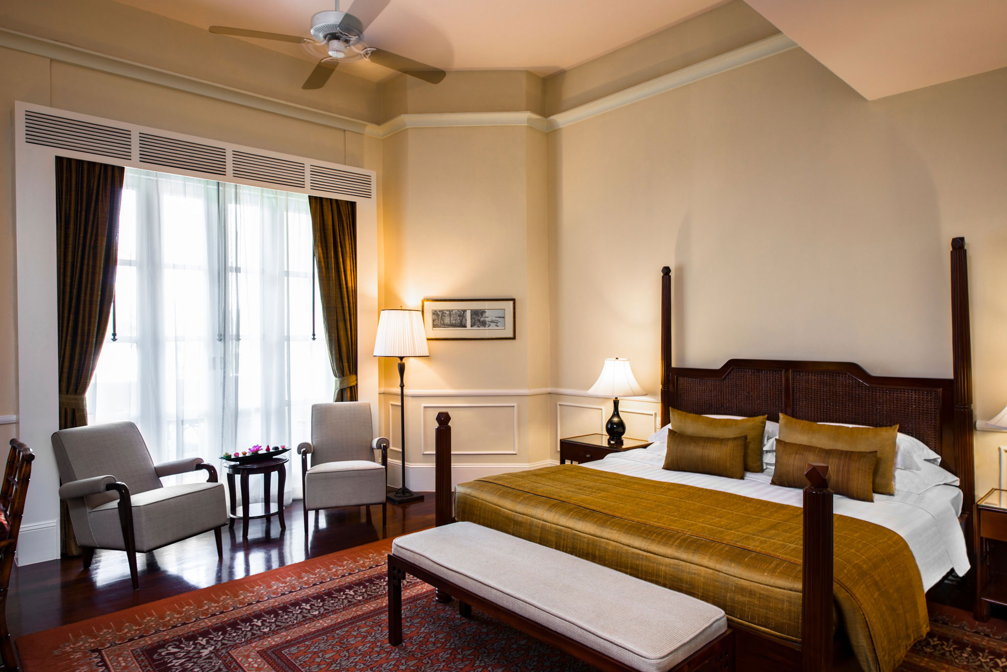 a bedroom with a bed and a rug