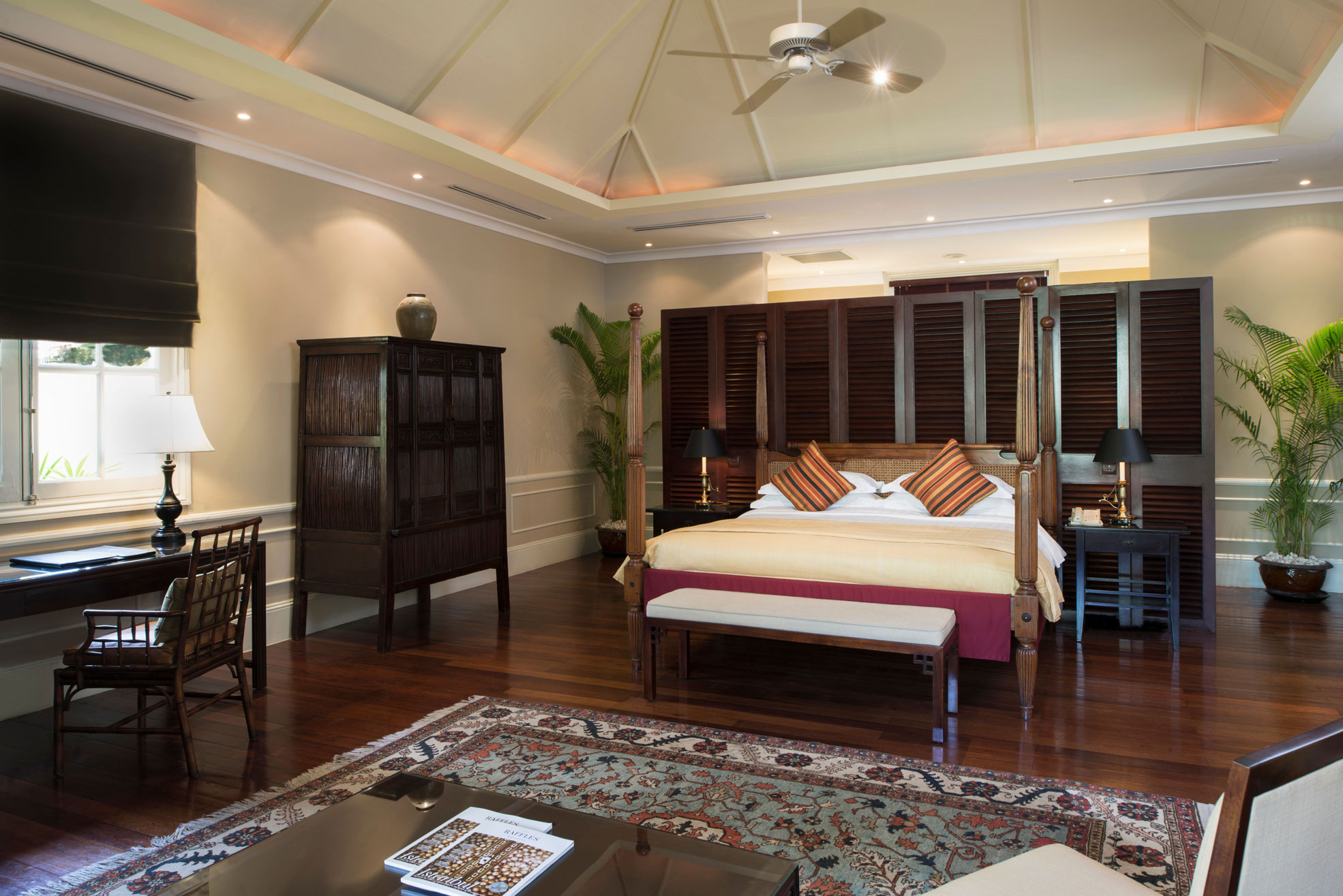 a room with a bed and a rug