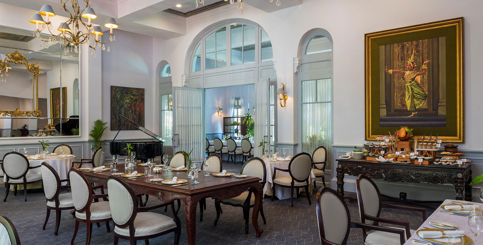 a room with tables and chairs
