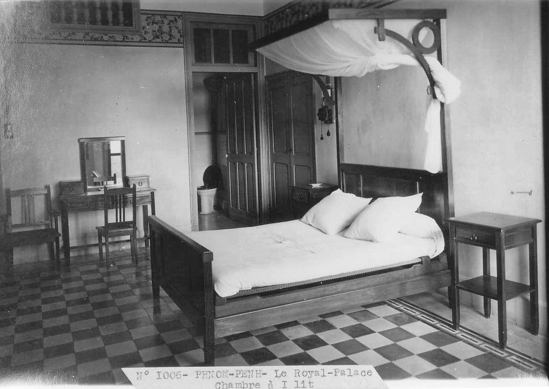 a bedroom with a canopy bed