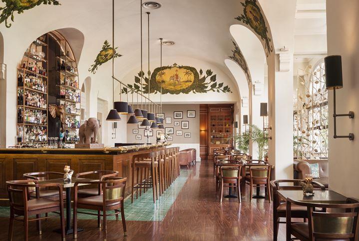 a restaurant with tables and chairs