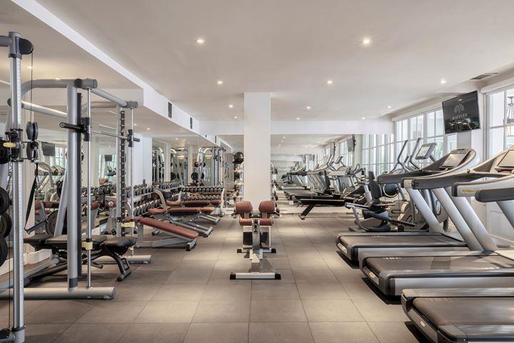 a large gym with exercise equipment