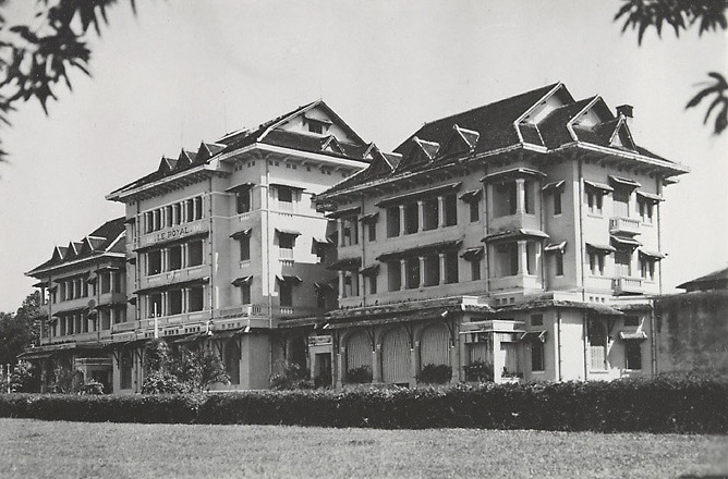 a large building with a lawn