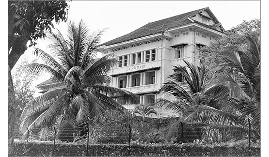a building with palm trees