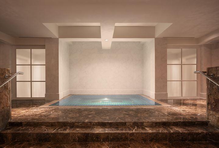 a indoor pool in a room