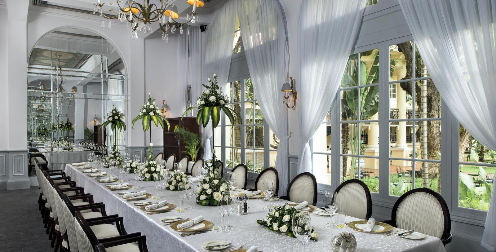a long table set for a formal dinner