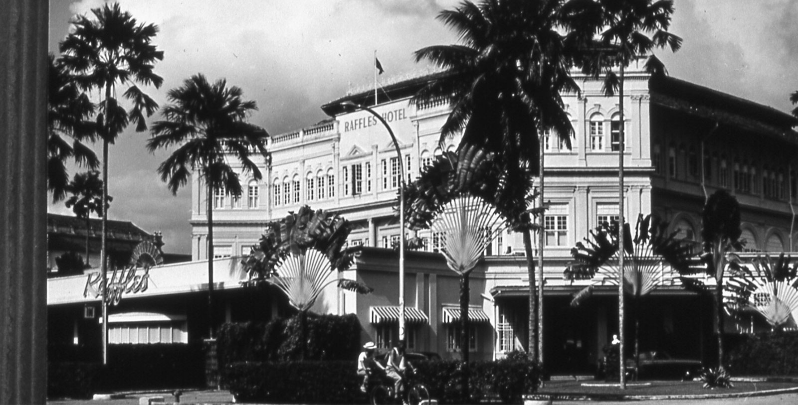 a black and white photo of a hotel