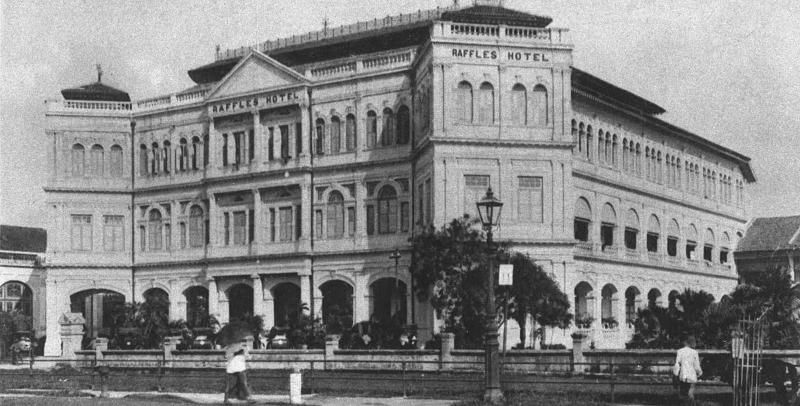 a black and white photo of a hotel