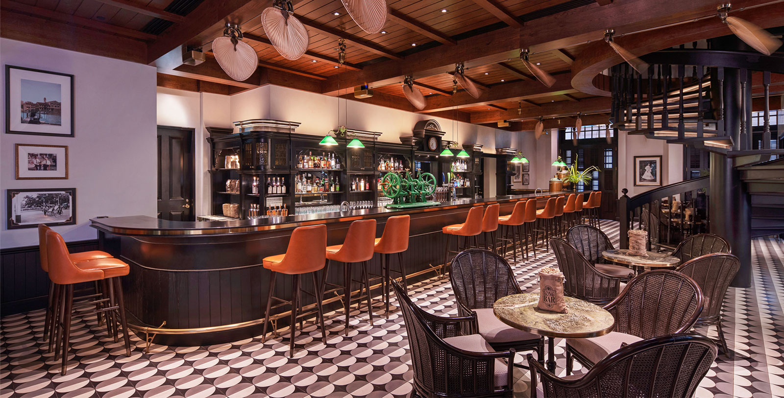 a bar with chairs and tables