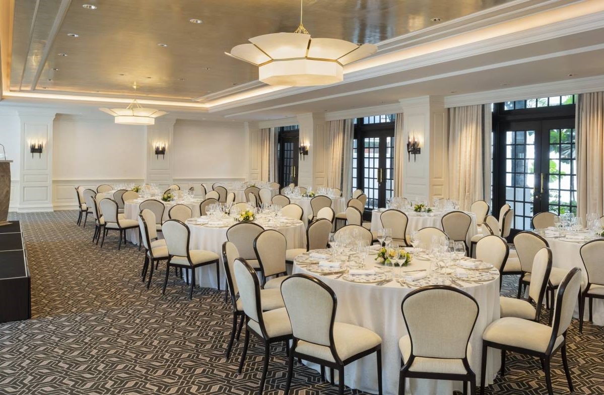 a room with tables and chairs