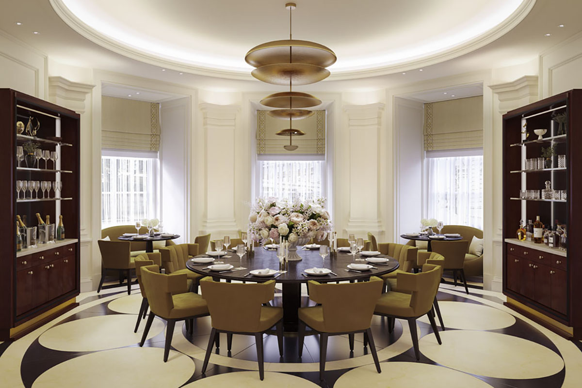 a room with a round table and chairs