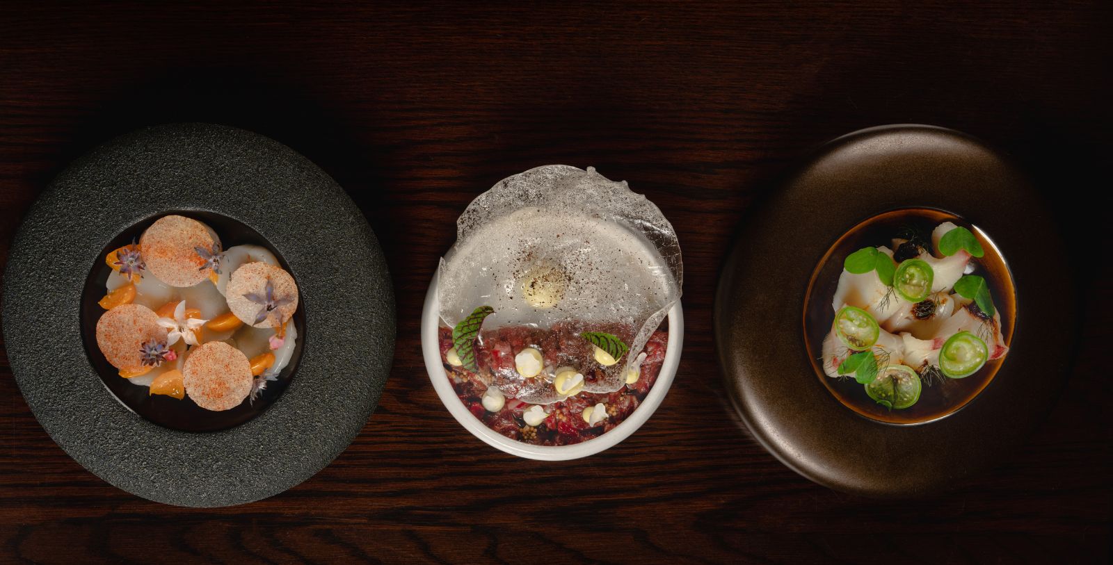 a group of plates with food on them