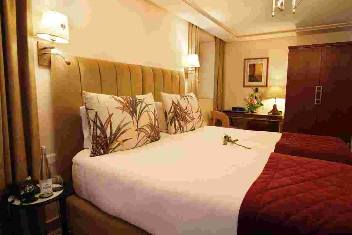 a bed with a flower on it