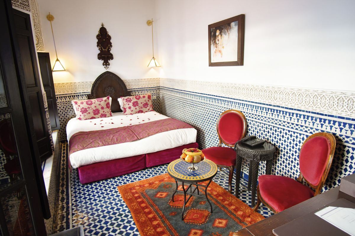 a room with a bed and a table