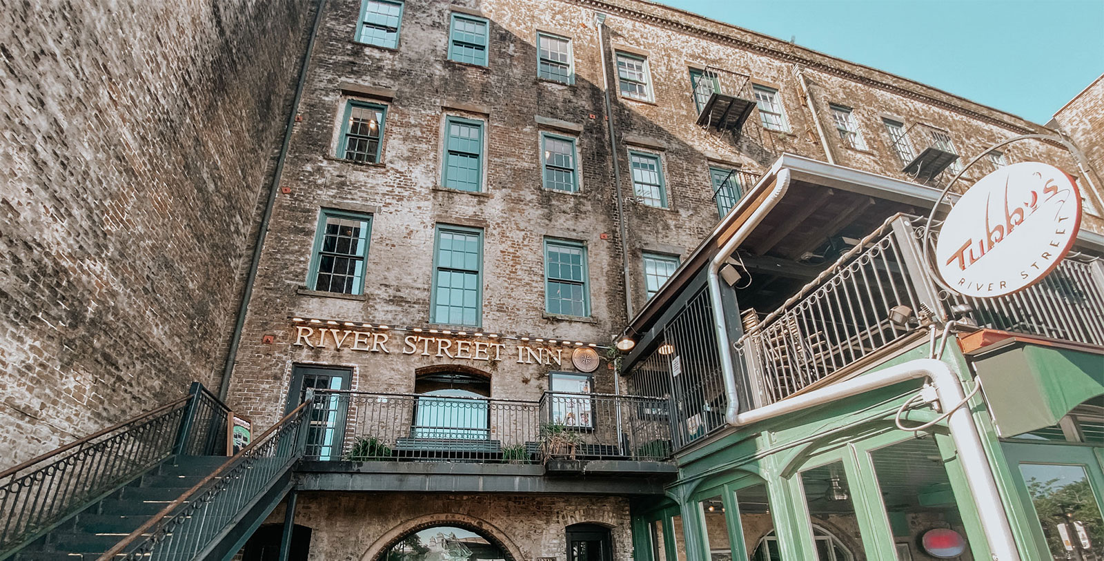 a building with a balcony and a railing