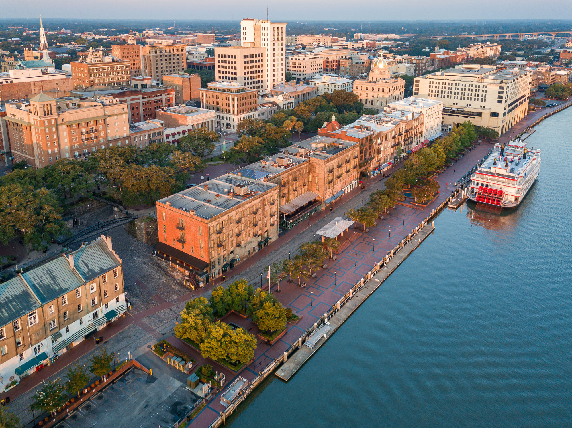 a city with a river and a boat