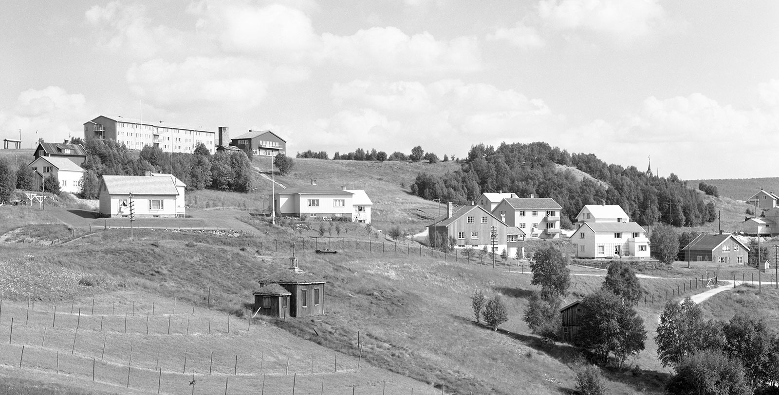a group of houses on a hill