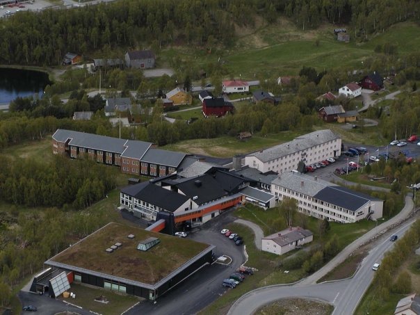 a group of buildings and trees