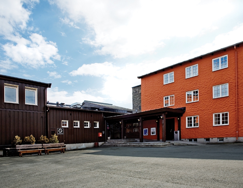 a building with a red building and a brown building