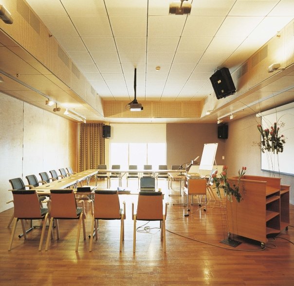 a room with a table and chairs