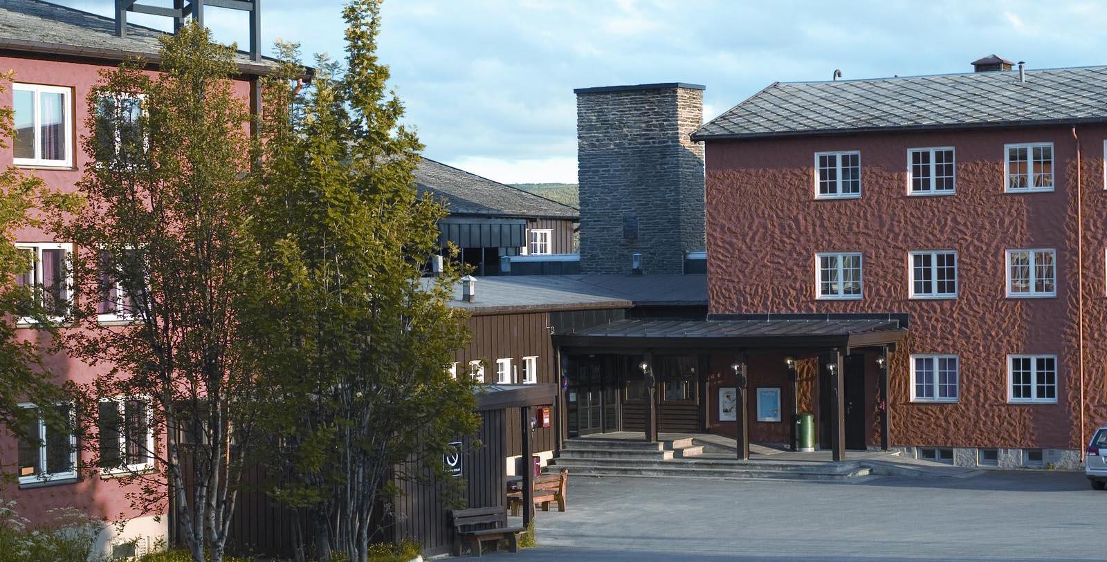 a building with a stone chimney