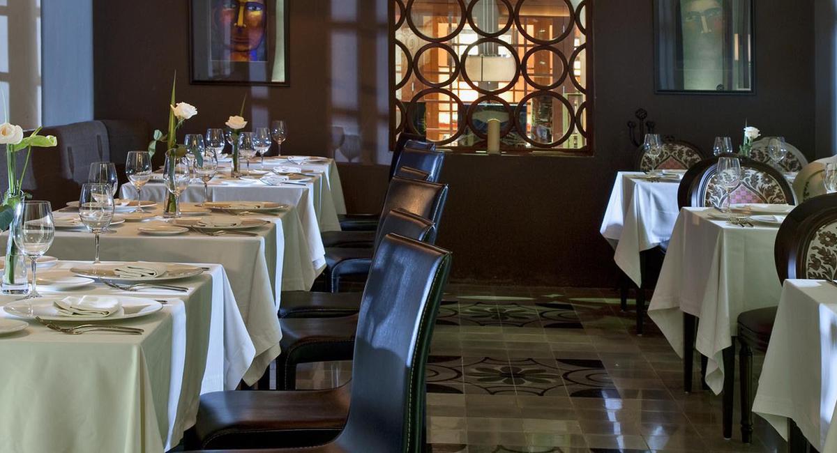 a restaurant with tables and chairs