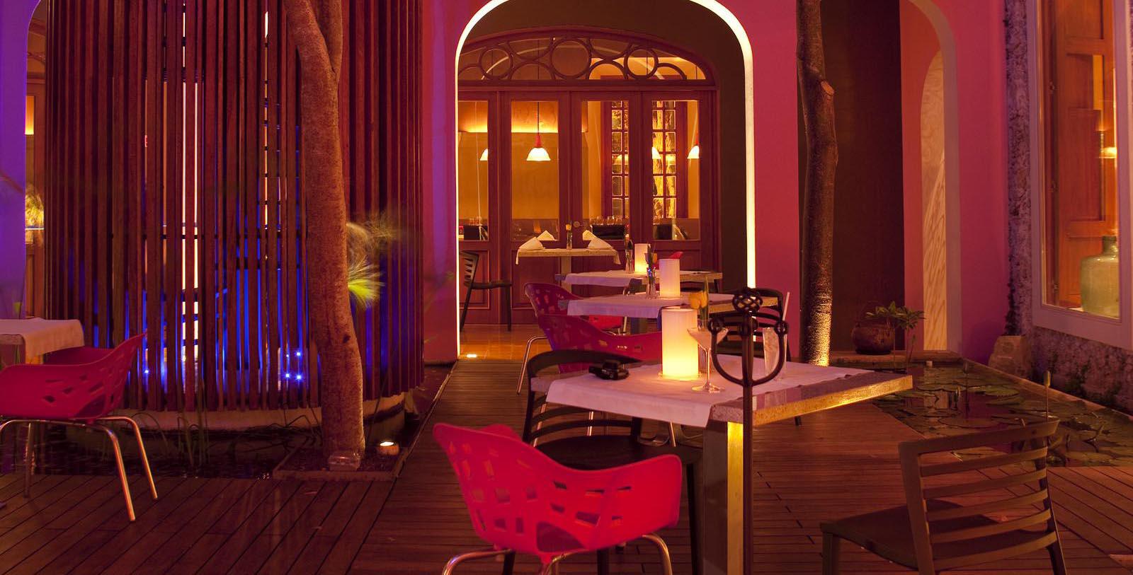 a restaurant with tables and chairs