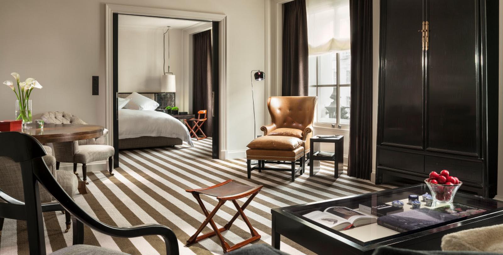 a room with a bed and a chair