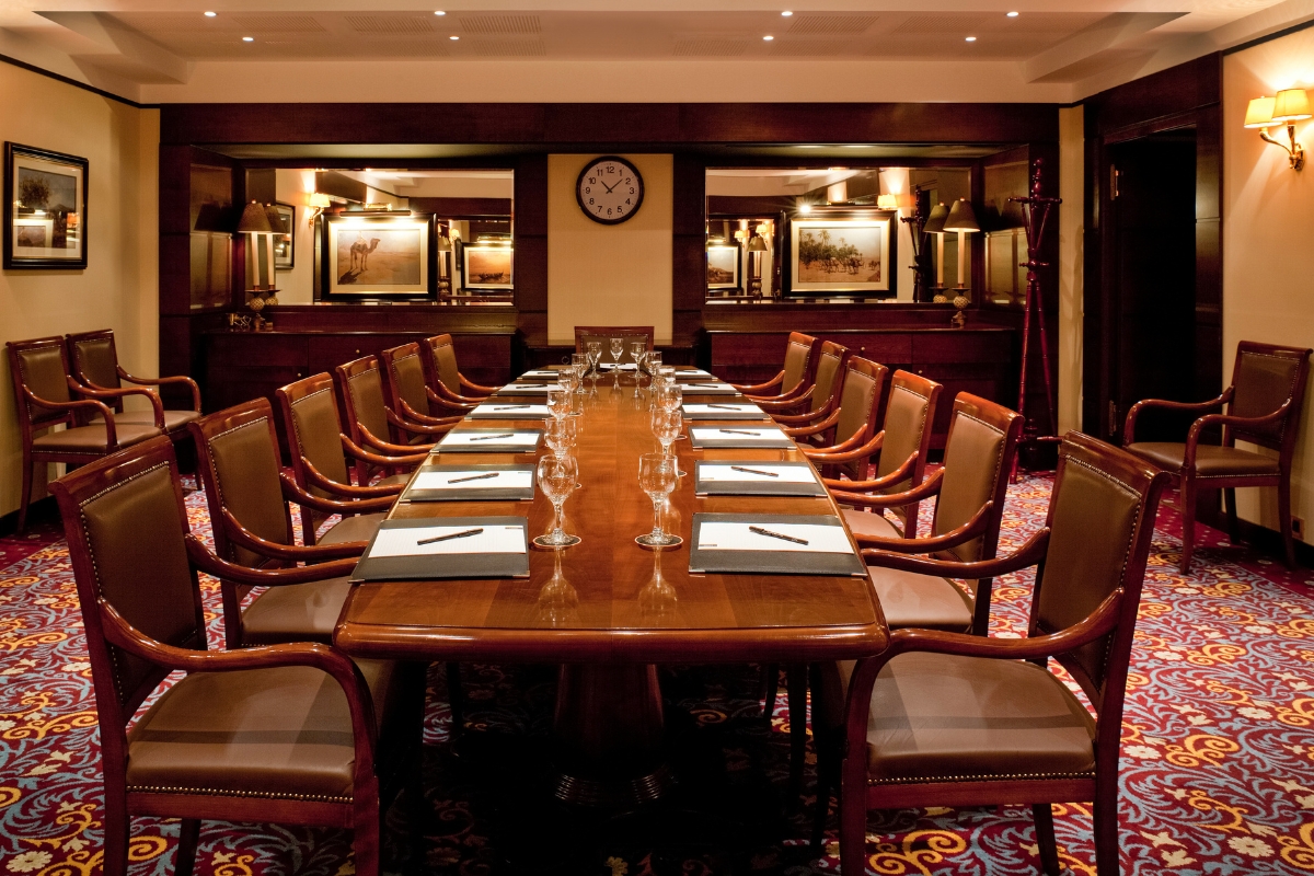 a room with a table and chairs