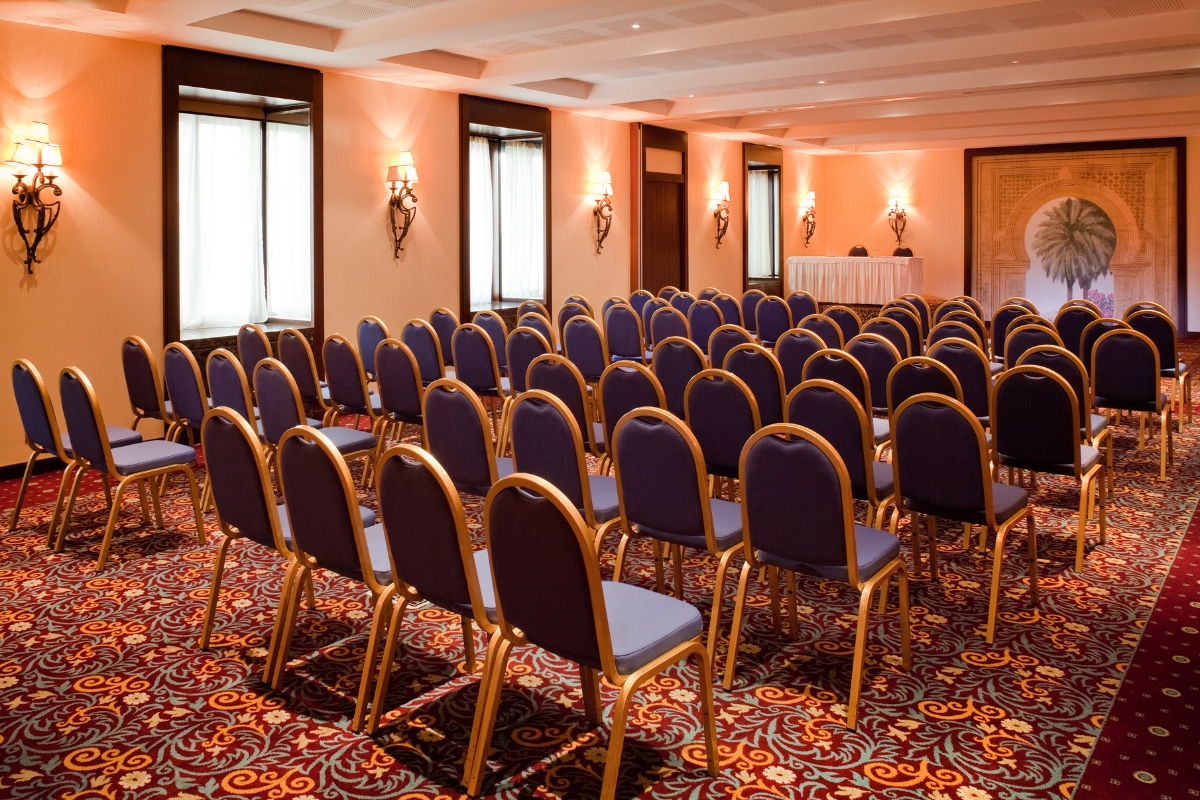 a room with rows of chairs