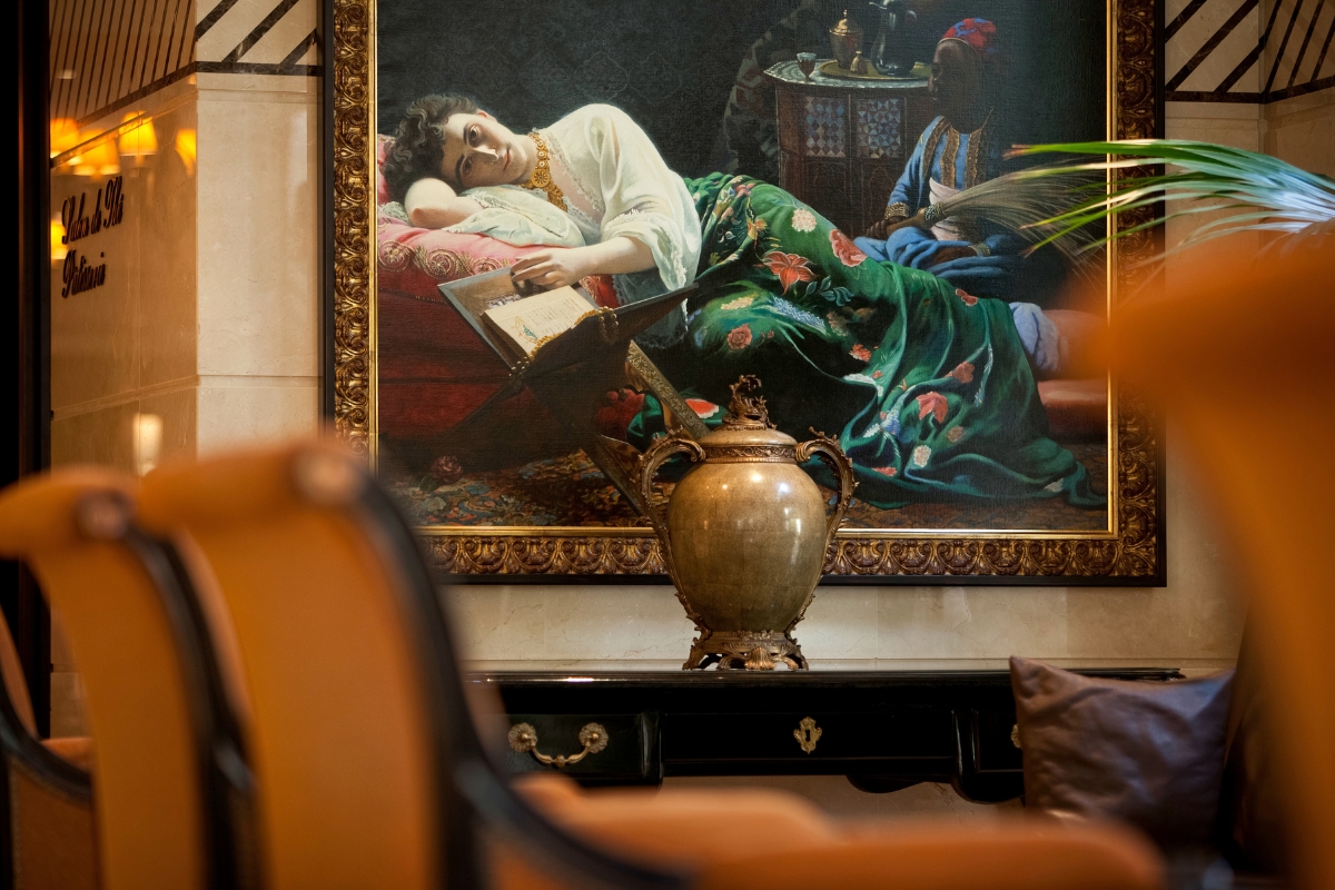 a painting of a woman sleeping on a couch