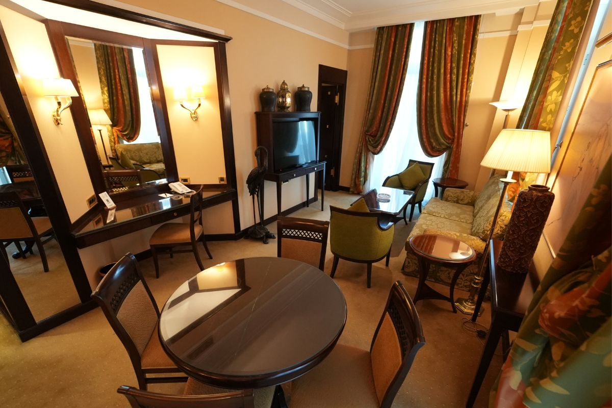 a room with a table and chairs