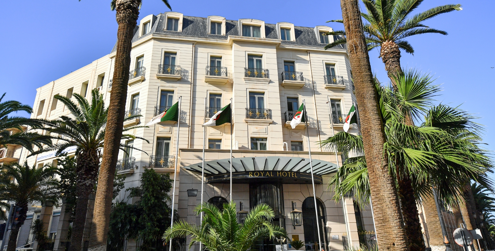 a building with flags in front of it