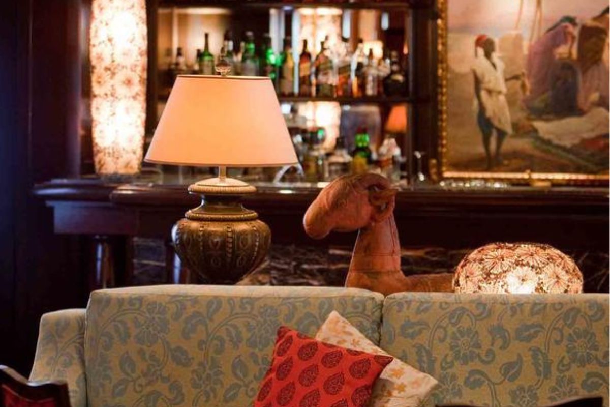 a lamp next to a couch