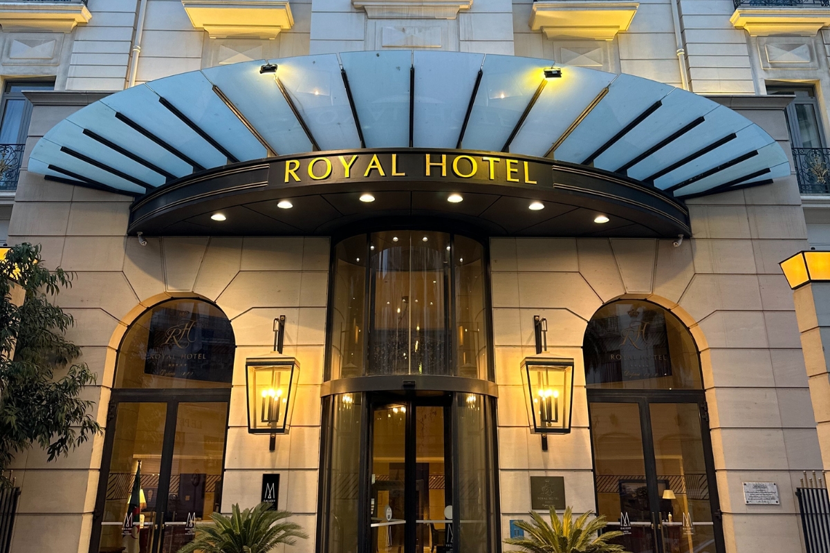 a building with a glass door and a sign