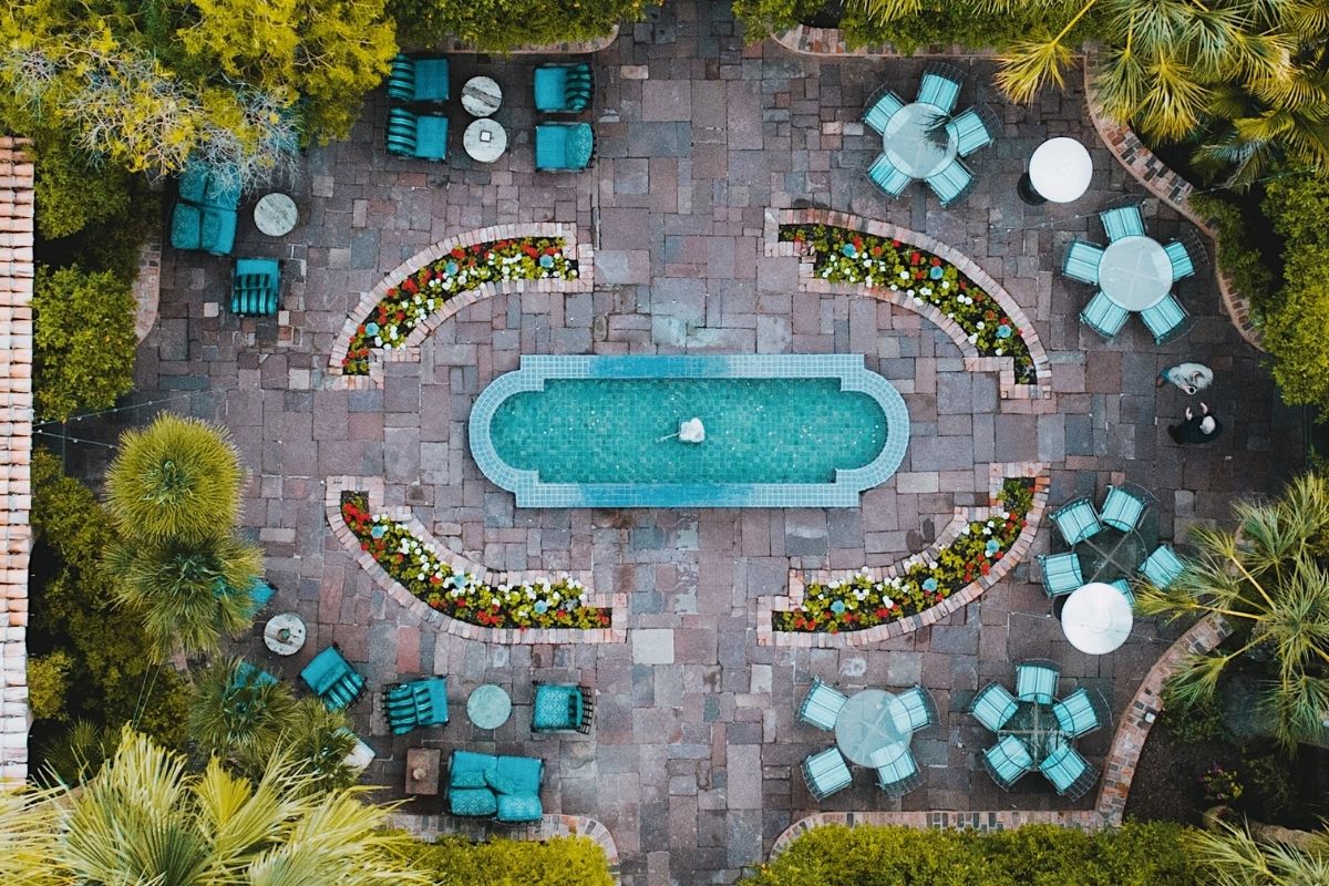 a pool surrounded by trees