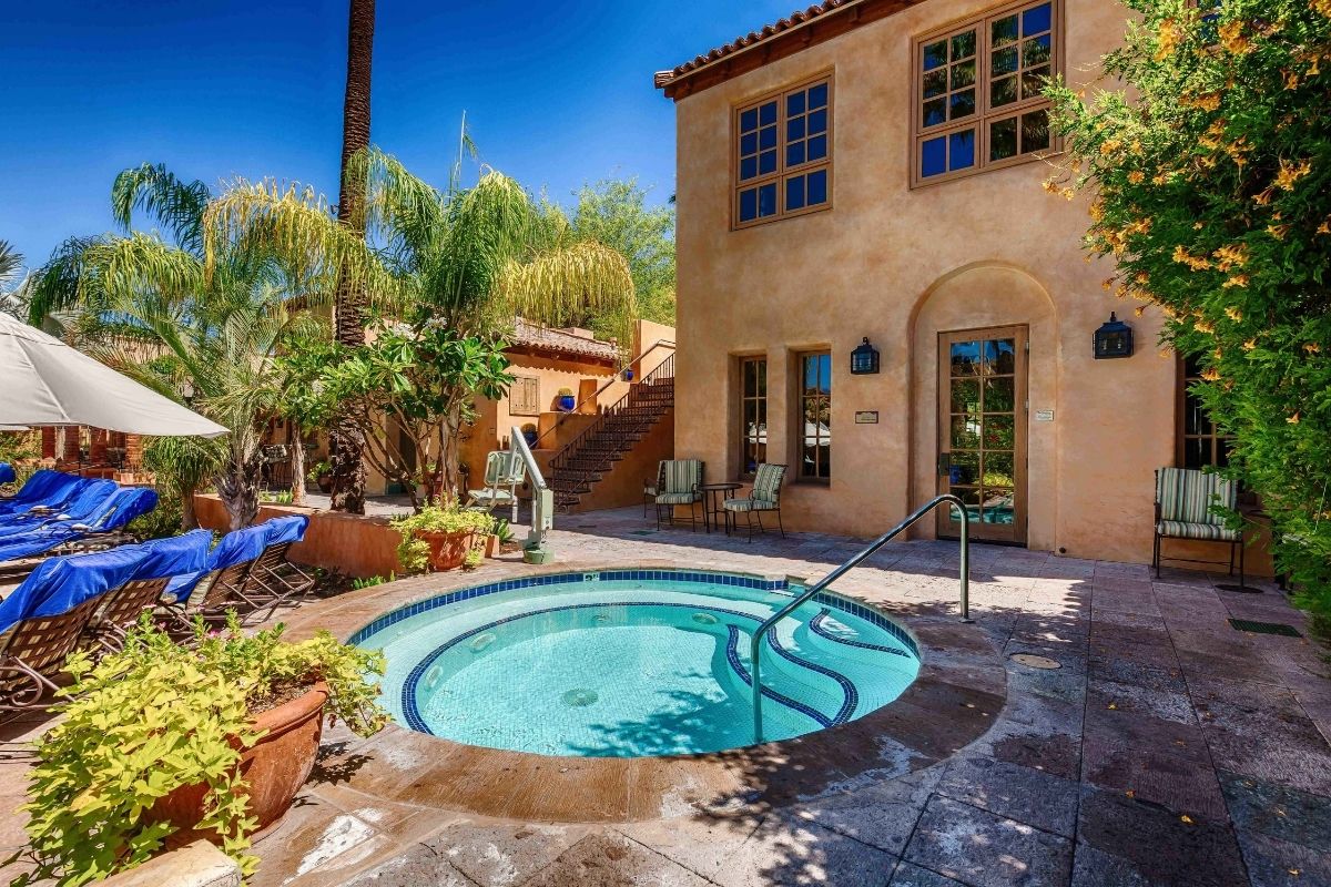 a hot tub in a courtyard