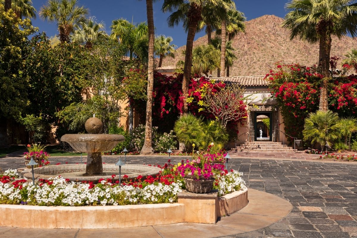 a fountain in front of a building