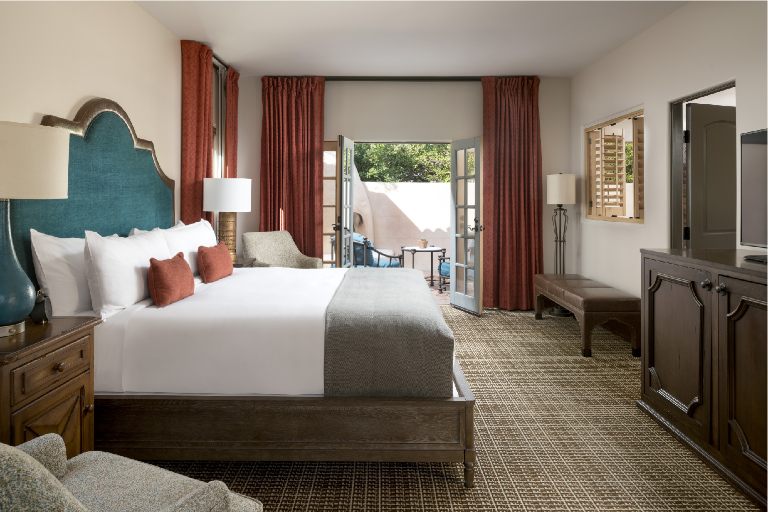 a room with a bed and a window