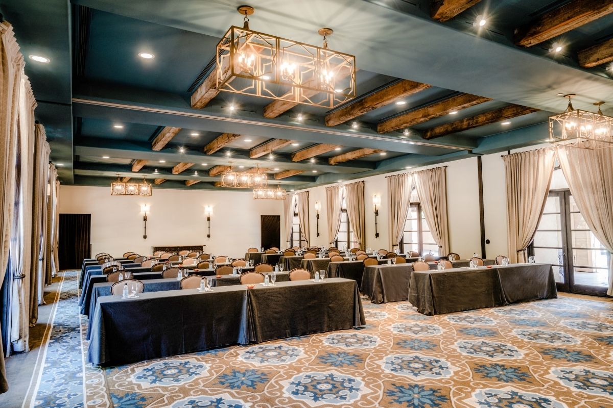 a room with tables and chairs