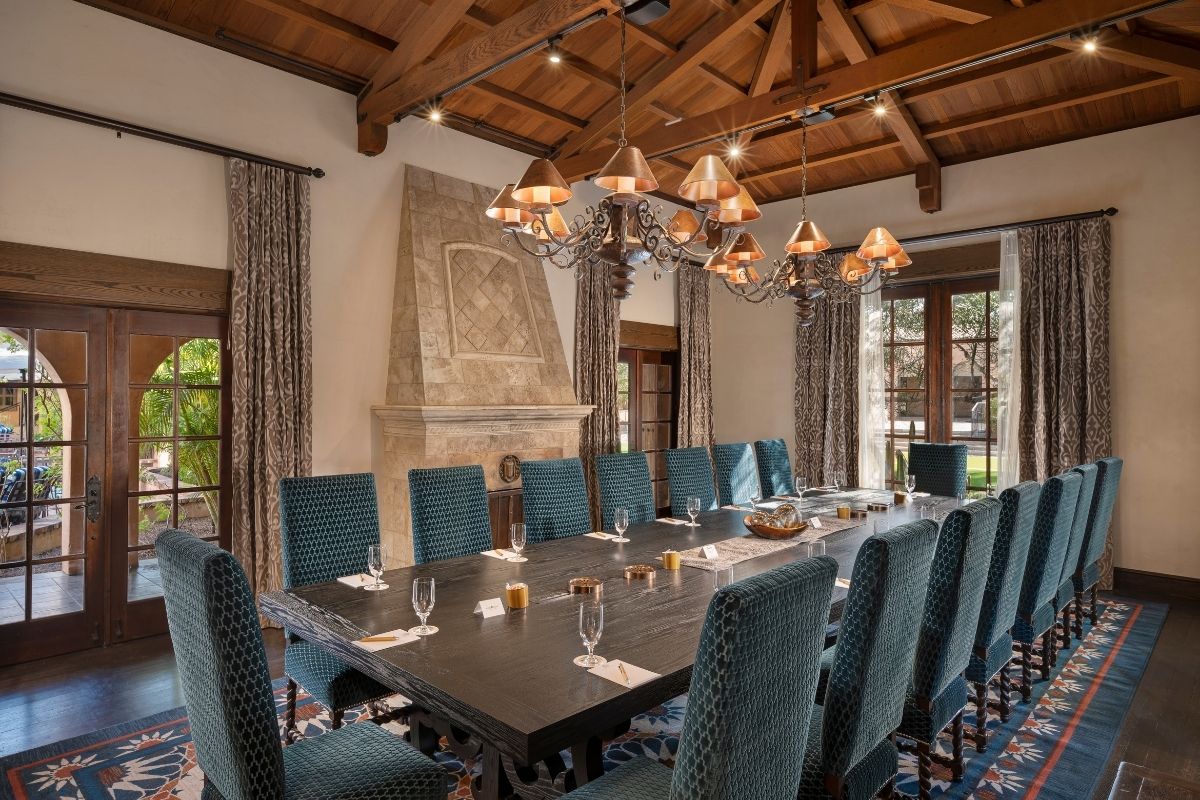 a large conference room with a large table and chairs